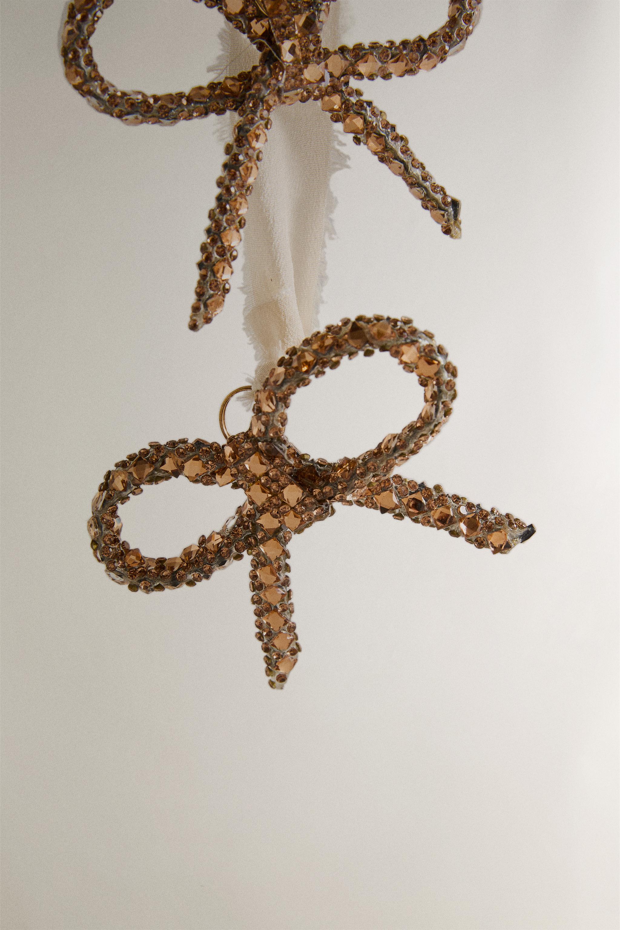 DÉCORATION CASCADÉE AVEC NŒUDS PAILLETTÉS DE NOËL